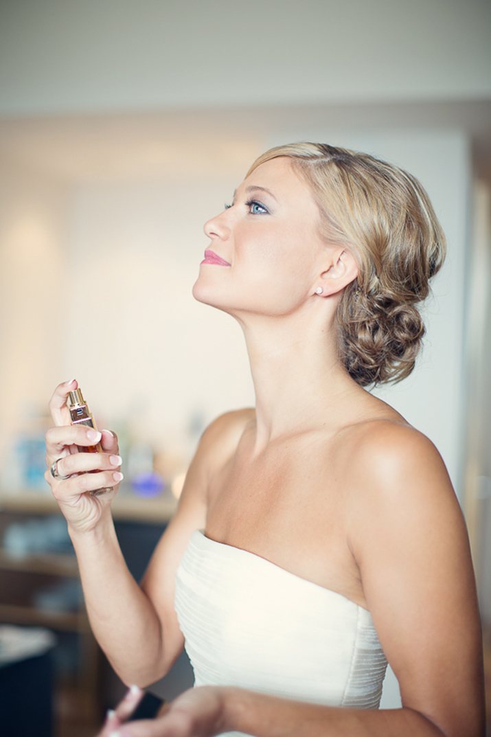 Bride Spraying Perfume