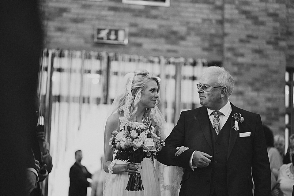 A bride wearing a Watters gown for a vintage travel inspired wedding. Photography by Libby Christensen libby christensen, watters wedding dress, vintage travel wedding