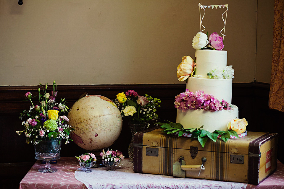 A bride wearing a Watters gown for a vintage travel inspired wedding. Photography by Libby Christensen libby christensen, watters wedding dress, vintage travel wedding
