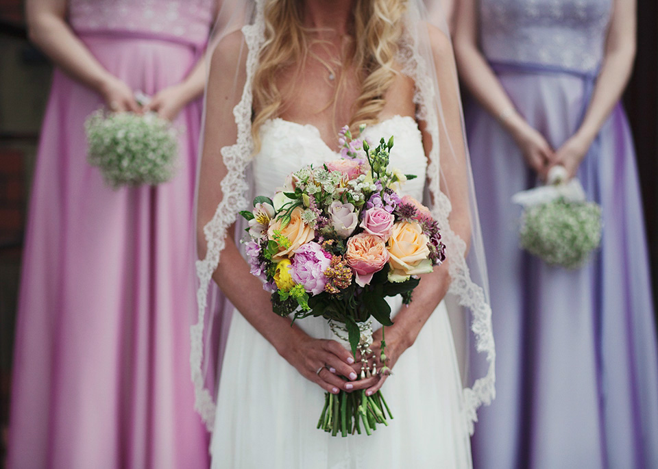 A bride wearing a Watters gown for a vintage travel inspired wedding. Photography by Libby Christensen libby christensen, watters wedding dress, vintage travel wedding