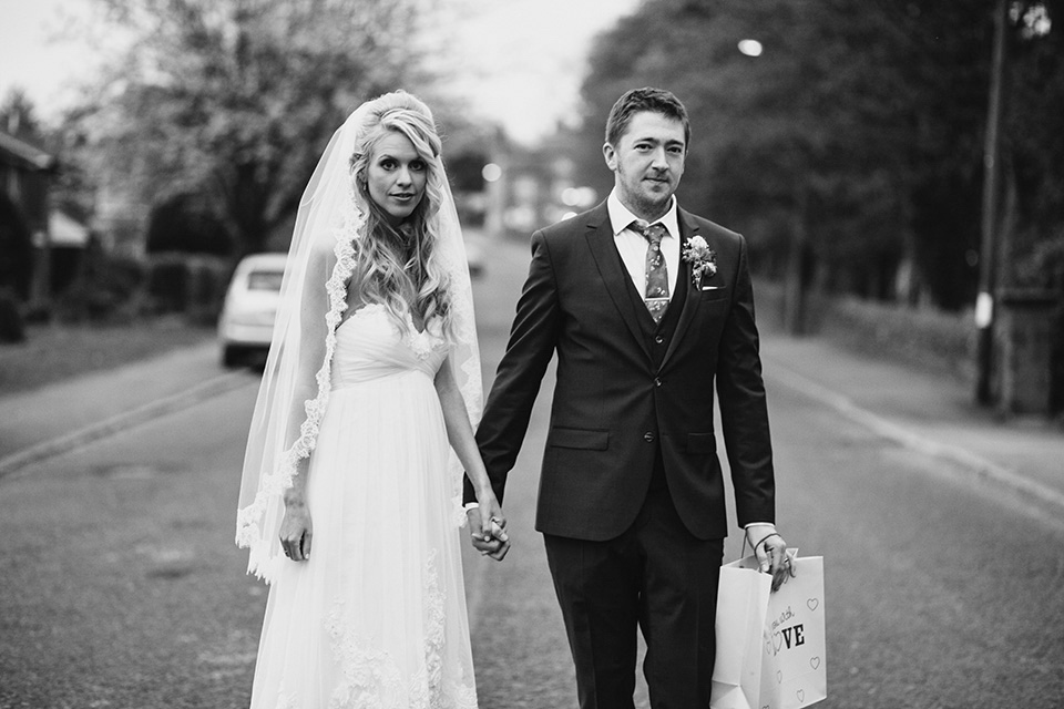 A bride wearing a Watters gown for a vintage travel inspired wedding. Photography by Libby Christensen libby christensen, watters wedding dress, vintage travel wedding