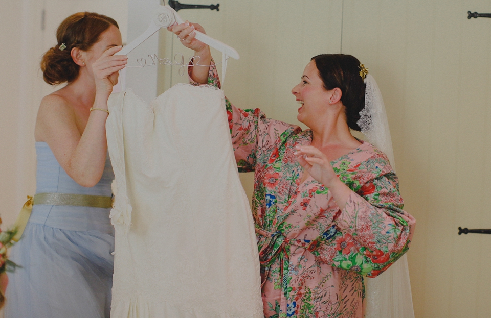 Bride Claire married her beau Olly at Porthilly Farm, Daymer Bay in Rock, Cornwall. Photography by Jess Petrie. 3-Padstow Cornwall pale blue gold seaside wedding