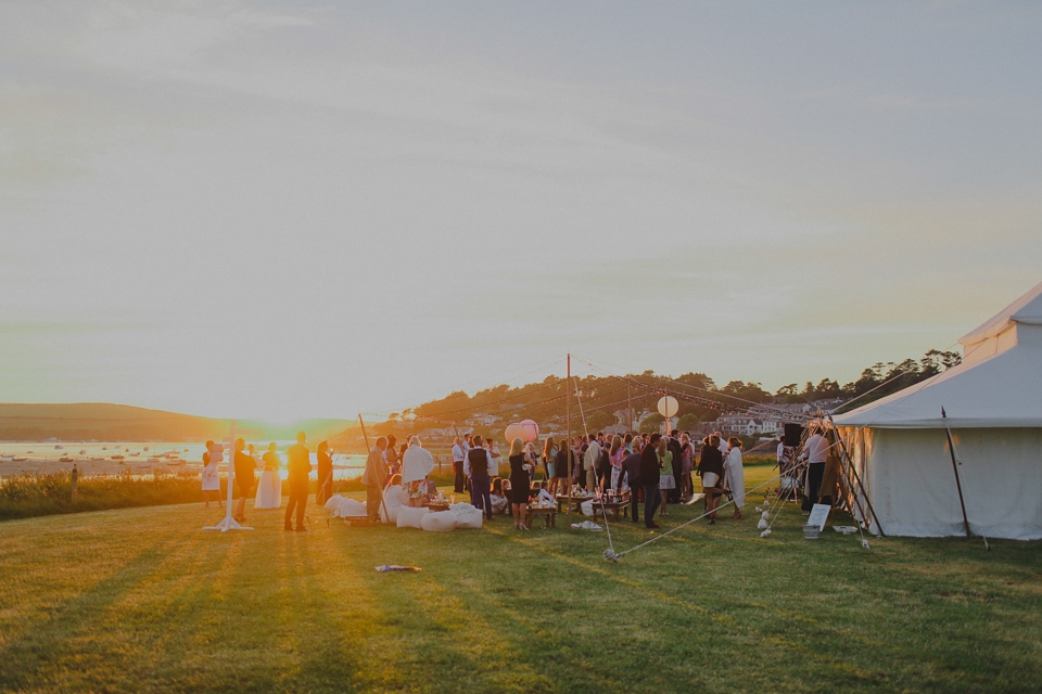 Bride Claire married her beau Olly at Porthilly Farm, Daymer Bay in Rock, Cornwall. Photography by Jess Petrie. 7-Padstow Cornwall pale blue gold seaside wedding