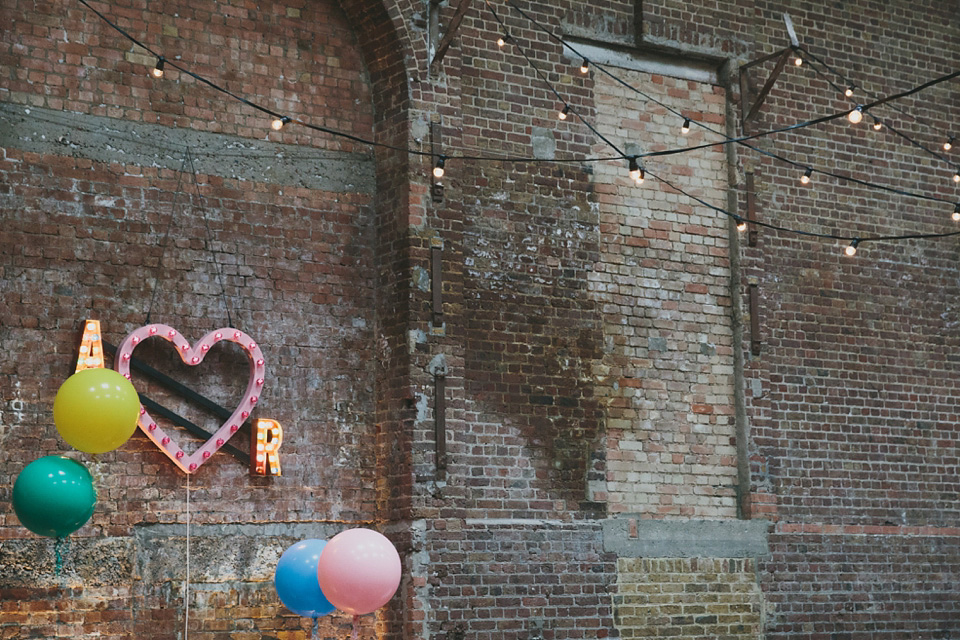 Bride Alex wears Lusan Mandongus for her London wedding held at the Village Underground in Shoreditch. Photography by McKInley Rodgers. village underground, shoreditch, lusan mandongus, mckinley rodgers