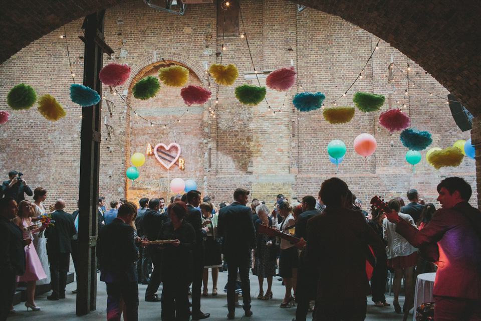 Bride Alex wears Lusan Mandongus for her London wedding held at the Village Underground in Shoreditch. Photography by McKInley Rodgers. village underground, shoreditch, lusan mandongus, mckinley rodgers
