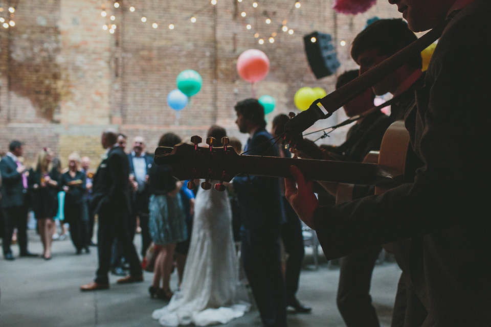 Bride Alex wears Lusan Mandongus for her London wedding held at the Village Underground in Shoreditch. Photography by McKInley Rodgers. village underground, shoreditch, lusan mandongus, mckinley rodgers