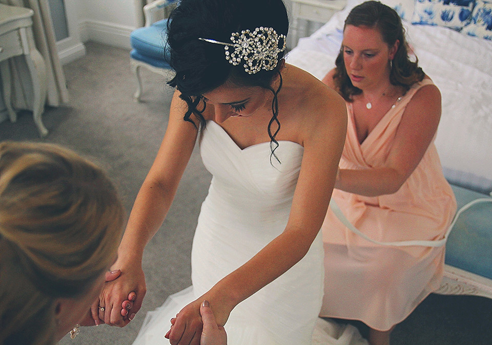 A bride wearing a Mori Lee dress for her pastel colour vintage-glam barn wedding. Photography by Diamonds and Doodles. mori lee, barn wedding, pastel wedding, vintage glam wedding, diamonds and doodles photography