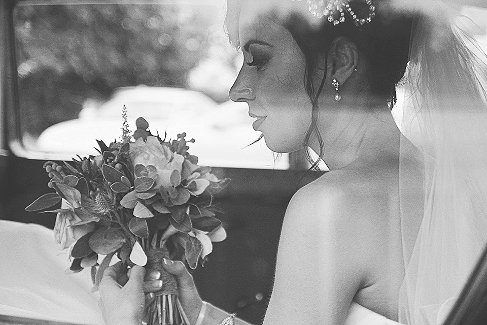 A bride wearing a Mori Lee dress for her pastel colour vintage-glam barn wedding. Photography by Diamonds and Doodles. mori lee, barn wedding, pastel wedding, vintage glam wedding, diamonds and doodles photography