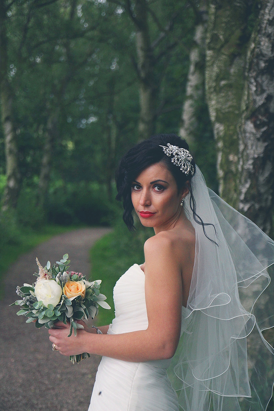 A bride wearing a Mori Lee dress for her pastel colour vintage-glam barn wedding. Photography by Diamonds and Doodles. mori lee, barn wedding, pastel wedding, vintage glam wedding, diamonds and doodles photography
