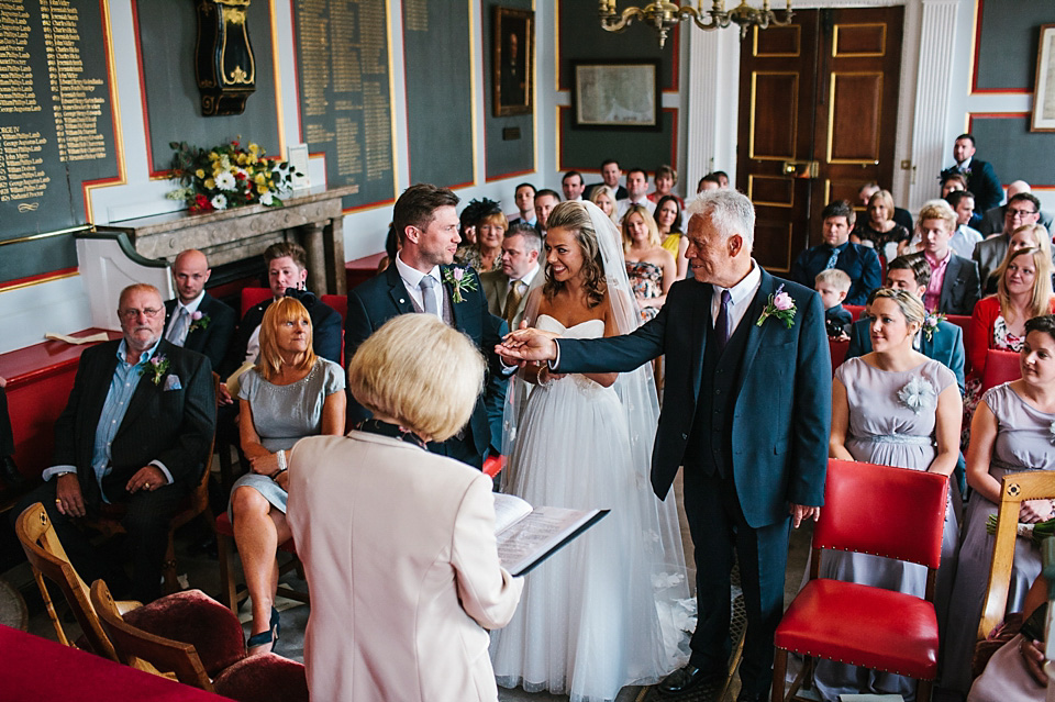 A bride wearing a David's Bridal gown and veil for her laid back and elegant wedding in Rye. Photography by Richard Ware. davids bridal, rye weddings, richard ware photography