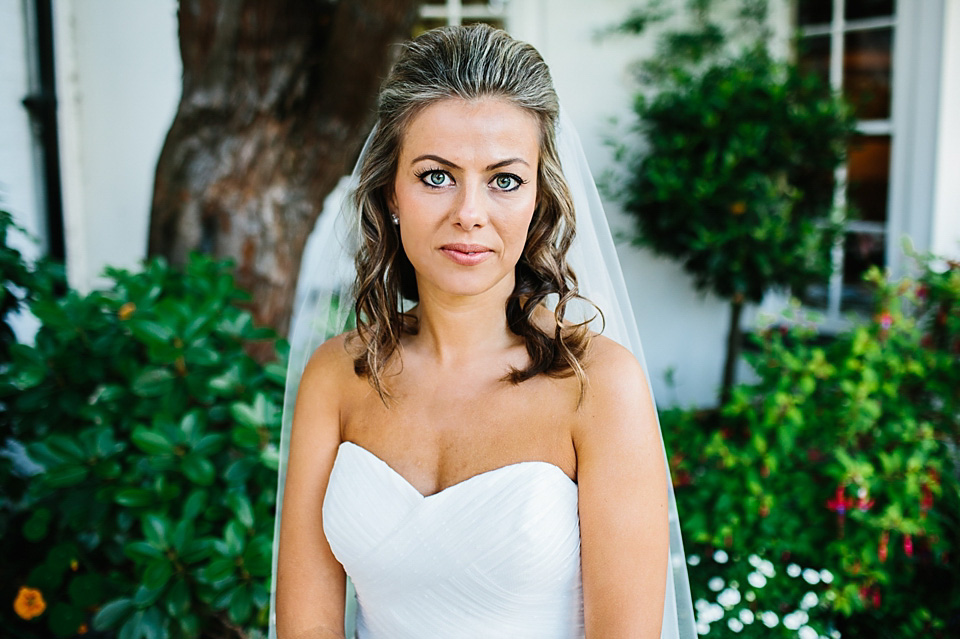 A bride wearing a David's Bridal gown and veil for her laid back and elegant wedding in Rye. Photography by Richard Ware. davids bridal, rye weddings, richard ware photography