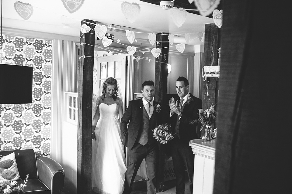 A bride wearing a David's Bridal gown and veil for her laid back and elegant wedding in Rye. Photography by Richard Ware. davids bridal, rye weddings, richard ware photography
