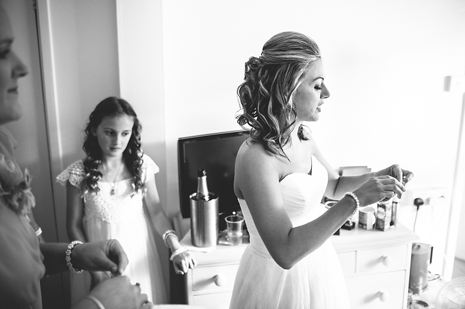 A bride wearing a David's Bridal gown and veil for her laid back and elegant wedding in Rye. Photography by Richard Ware. davids bridal, rye weddings, richard ware photography