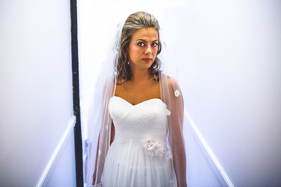 A bride wearing a David's Bridal gown and veil for her laid back and elegant wedding in Rye. Photography by Richard Ware. davids bridal, rye weddings, richard ware photography