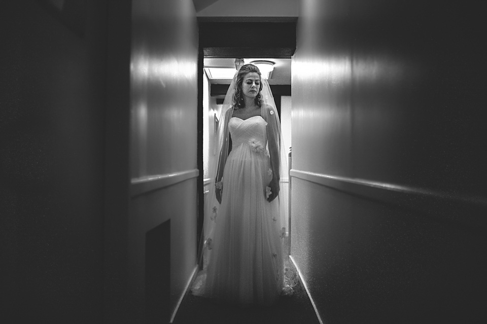 A bride wearing a David's Bridal gown and veil for her laid back and elegant wedding in Rye. Photography by Richard Ware. davids bridal, rye weddings, richard ware photography