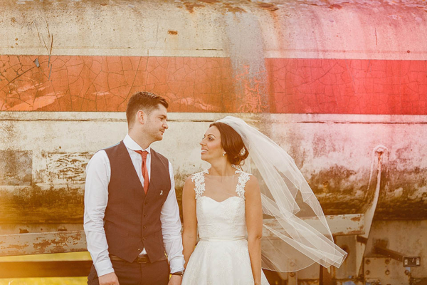 A 50’s Style Gown and a 60’s Inspired Short and Pretty Poofy Veil