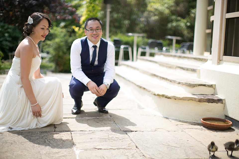 chinese bride, red wedding dress, kensington rooftop gardens, nicholas lau photography