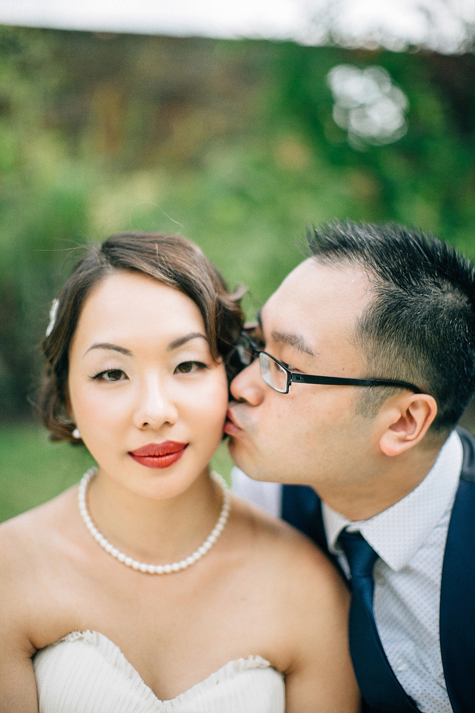 chinese bride, red wedding dress, kensington rooftop gardens, nicholas lau photography