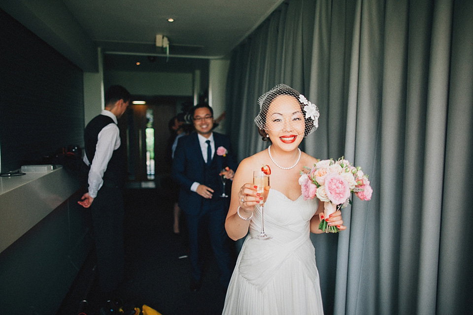 chinese bride, red wedding dress, kensington rooftop gardens, nicholas lau photography