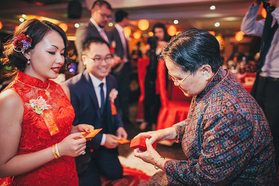 chinese bride, red wedding dress, kensington rooftop gardens, nicholas lau photography