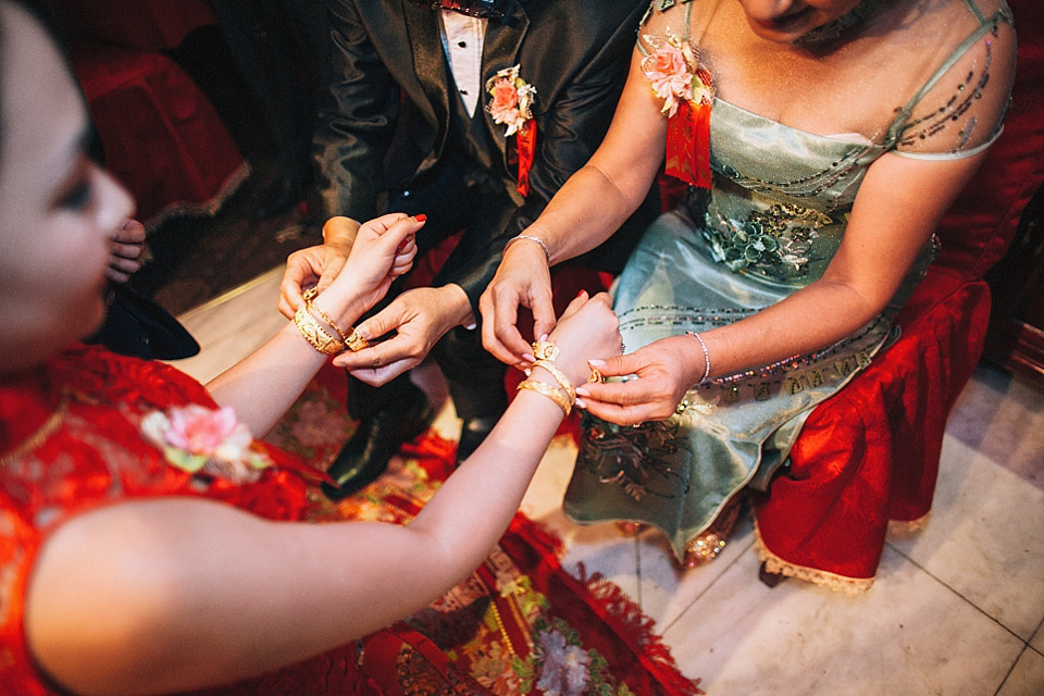 chinese bride, red wedding dress, kensington rooftop gardens, nicholas lau photography