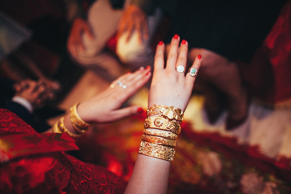 chinese bride, red wedding dress, kensington rooftop gardens, nicholas lau photography