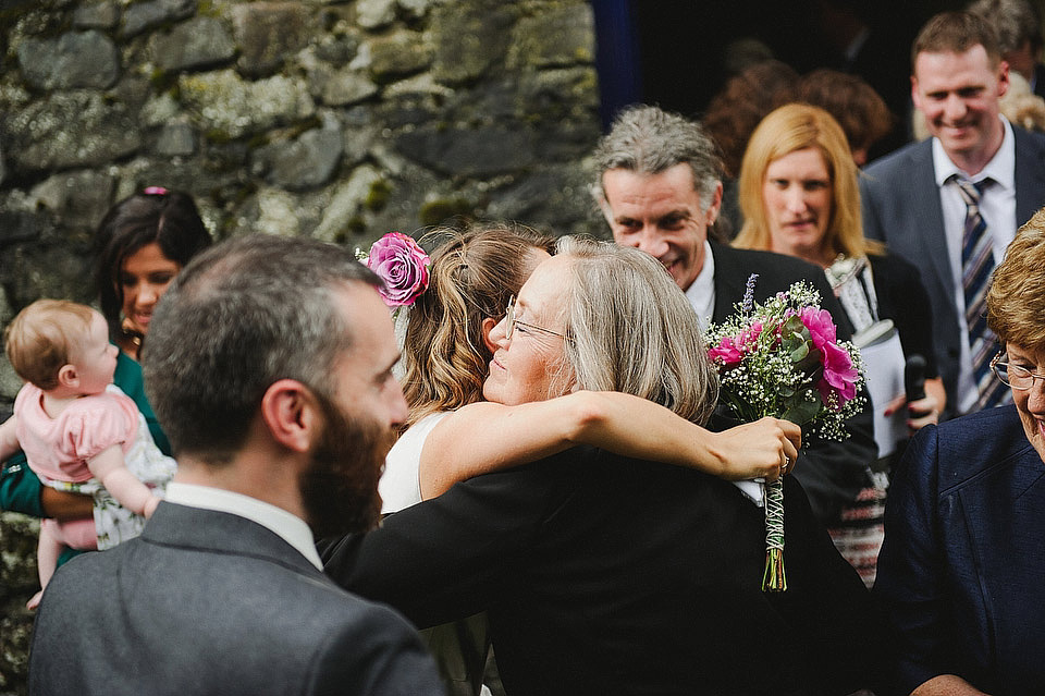 A bride wearing a 'Ghost' wedding dress for her Irish country house wedding inspired by music and traditions. Photography by This Modern Love irish bride, ghost wedding dress, this modern love wedding photography, irish country house wedding