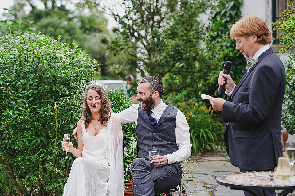 A bride wearing a 'Ghost' wedding dress for her Irish country house wedding inspired by music and traditions. Photography by This Modern Love irish bride, ghost wedding dress, this modern love wedding photography, irish country house wedding