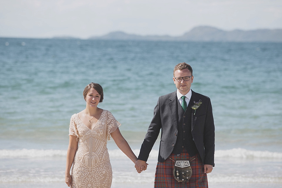 A bride wearing a beautifully embellished Eliza Jane Howell wedding dress for her seaside Scottish humanist wedding ceremony. Images by Mirrorbox Photography. mirrorbox photography, humanist ceremony, beach wedding, seaside wedding, eliza jane howell wedding dress