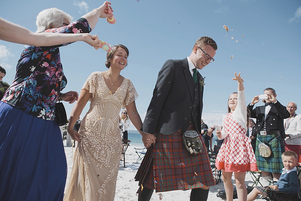 A bride wearing a beautifully embellished Eliza Jane Howell wedding dress for her seaside Scottish humanist wedding ceremony. Images by Mirrorbox Photography. mirrorbox photography, humanist ceremony, beach wedding, seaside wedding, eliza jane howell wedding dress