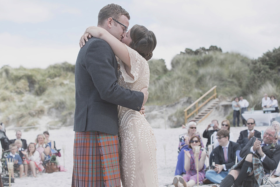A bride wearing a beautifully embellished Eliza Jane Howell wedding dress for her seaside Scottish humanist wedding ceremony. Images by Mirrorbox Photography. mirrorbox photography, humanist ceremony, beach wedding, seaside wedding, eliza jane howell wedding dress