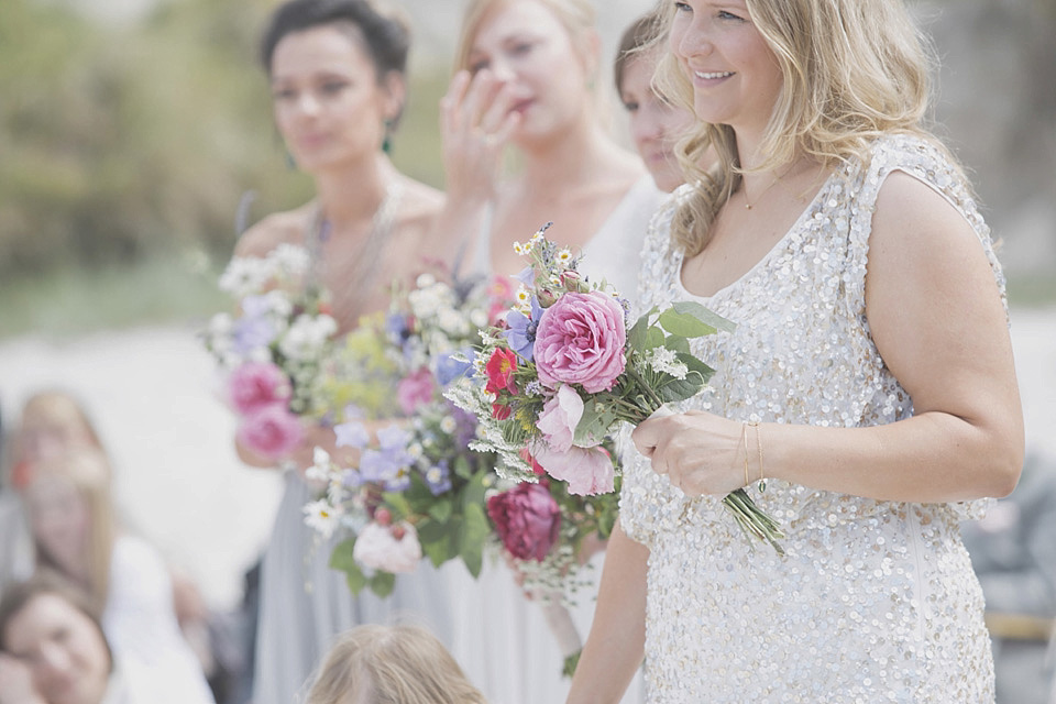 A bride wearing a beautifully embellished Eliza Jane Howell wedding dress for her seaside Scottish humanist wedding ceremony. Images by Mirrorbox Photography. mirrorbox photography, humanist ceremony, beach wedding, seaside wedding, eliza jane howell wedding dress