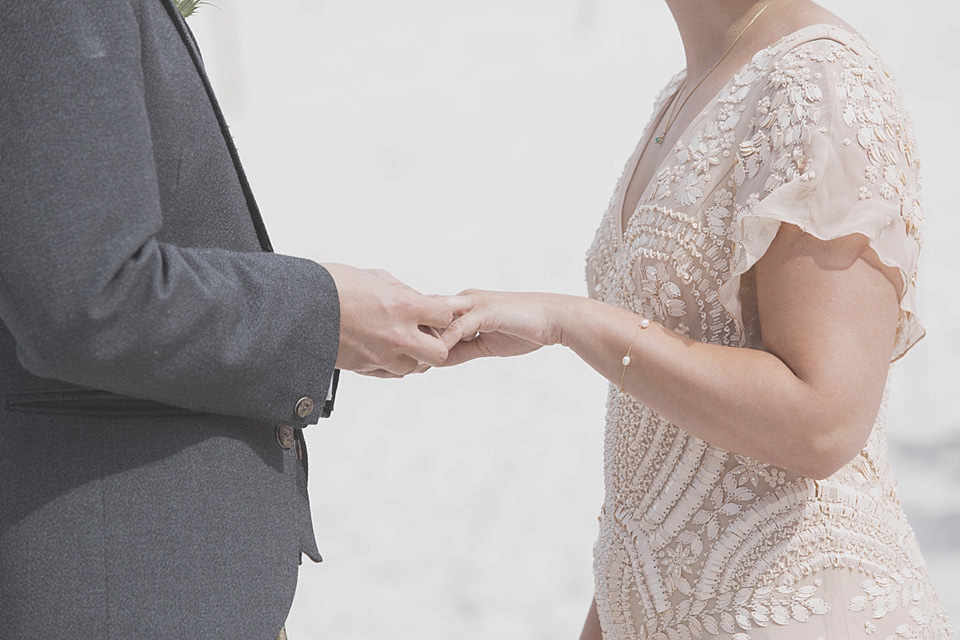 A bride wearing a beautifully embellished Eliza Jane Howell wedding dress for her seaside Scottish humanist wedding ceremony. Images by Mirrorbox Photography. mirrorbox photography, humanist ceremony, beach wedding, seaside wedding, eliza jane howell wedding dress