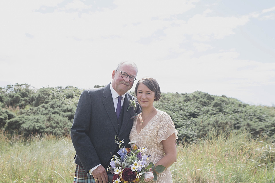 A bride wearing a beautifully embellished Eliza Jane Howell wedding dress for her seaside Scottish humanist wedding ceremony. Images by Mirrorbox Photography. mirrorbox photography, humanist ceremony, beach wedding, seaside wedding, eliza jane howell wedding dress