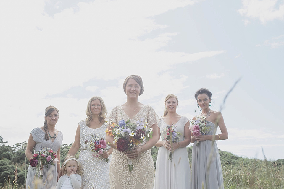 A bride wearing a beautifully embellished Eliza Jane Howell wedding dress for her seaside Scottish humanist wedding ceremony. Images by Mirrorbox Photography. mirrorbox photography, humanist ceremony, beach wedding, seaside wedding, eliza jane howell wedding dress