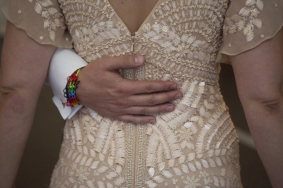A bride wearing a beautifully embellished Eliza Jane Howell wedding dress for her seaside Scottish humanist wedding ceremony. Images by Mirrorbox Photography. mirrorbox photography, humanist ceremony, beach wedding, seaside wedding, eliza jane howell wedding dress