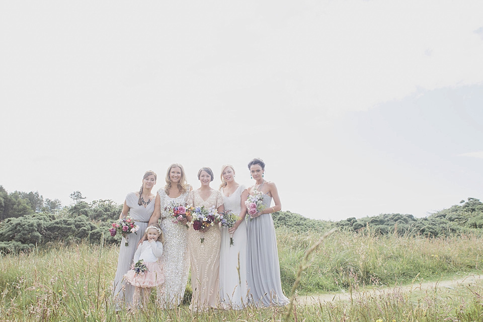 A bride wearing a beautifully embellished Eliza Jane Howell wedding dress for her seaside Scottish humanist wedding ceremony. Images by Mirrorbox Photography. mirrorbox photography, humanist ceremony, beach wedding, seaside wedding, eliza jane howell wedding dress