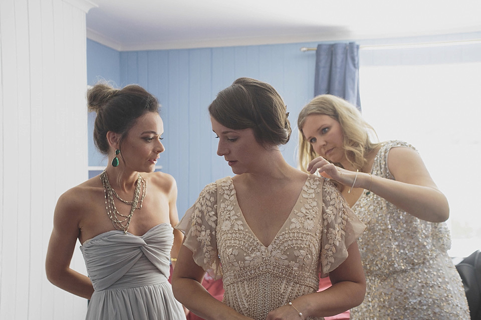A bride wearing a beautifully embellished Eliza Jane Howell wedding dress for her seaside Scottish humanist wedding ceremony. Images by Mirrorbox Photography. mirrorbox photography, humanist ceremony, beach wedding, seaside wedding, eliza jane howell wedding dress