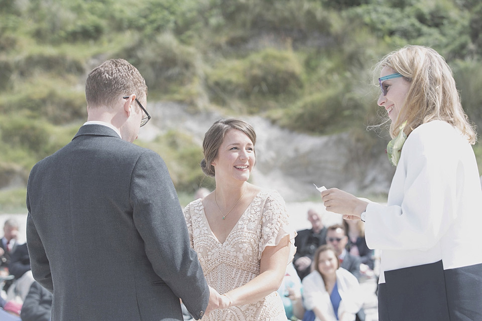 A bride wearing a beautifully embellished Eliza Jane Howell wedding dress for her seaside Scottish humanist wedding ceremony. Images by Mirrorbox Photography. mirrorbox photography, humanist ceremony, beach wedding, seaside wedding, eliza jane howell wedding dress