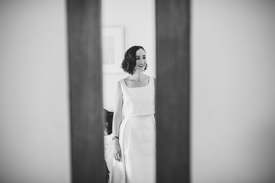 A bride wearing a two-piece wedding dress by Susie Stone of London for her wedding at Crear in Scotland. Photography by Lisa Devine. susie stone wedding dress, 2 piece wedding dress, two piece wedding dress, wedding dress separates, crear, scottish weddings, lisa devine photography