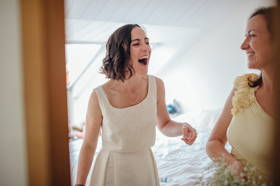 A bride wearing a two-piece wedding dress by Susie Stone of London for her wedding at Crear in Scotland. Photography by Lisa Devine. susie stone wedding dress, 2 piece wedding dress, two piece wedding dress, wedding dress separates, crear, scottish weddings, lisa devine photography