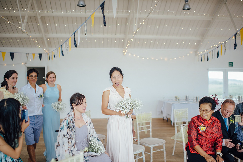A bride wearing a two-piece wedding dress by Susie Stone of London for her wedding at Crear in Scotland. Photography by Lisa Devine. susie stone wedding dress, 2 piece wedding dress, two piece wedding dress, wedding dress separates, crear, scottish weddings, lisa devine photography