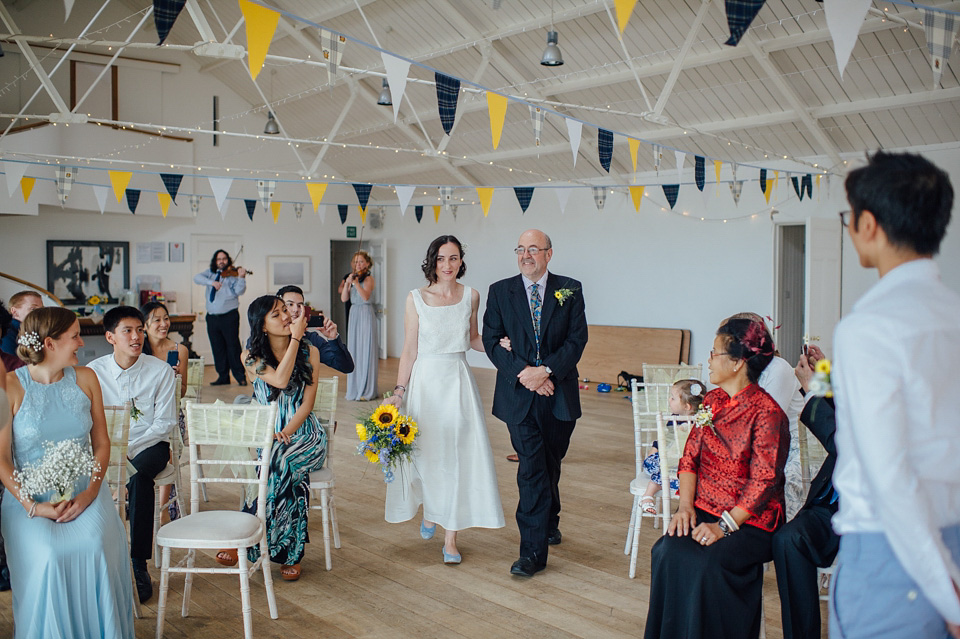 A bride wearing a two-piece wedding dress by Susie Stone of London for her wedding at Crear in Scotland. Photography by Lisa Devine. susie stone wedding dress, 2 piece wedding dress, two piece wedding dress, wedding dress separates, crear, scottish weddings, lisa devine photography