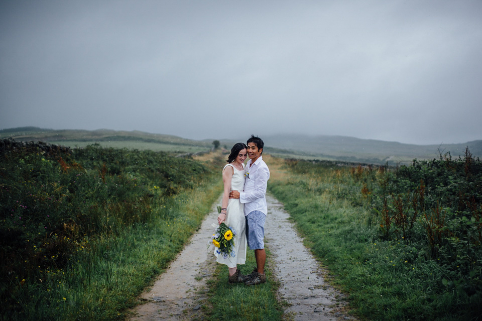 A bride wearing a two-piece wedding dress by Susie Stone of London for her wedding at Crear in Scotland. Photography by Lisa Devine. susie stone wedding dress, 2 piece wedding dress, two piece wedding dress, wedding dress separates, crear, scottish weddings, lisa devine photography