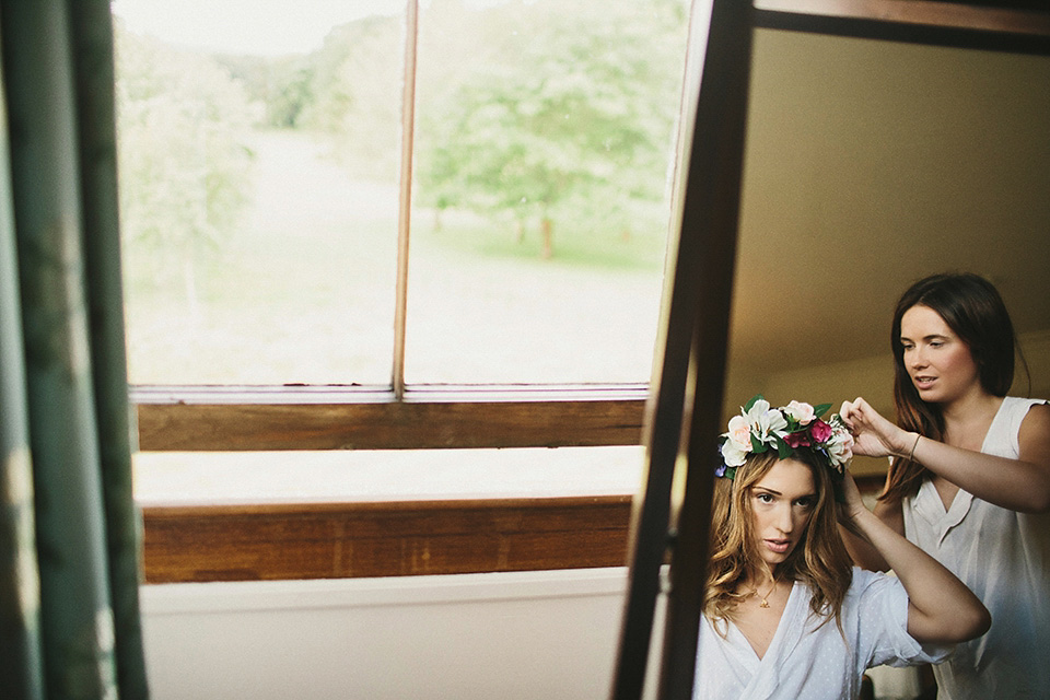A beautiful bride wearing a Tatyana Merenyuk wedding dress and self-made floral crown for her Tipi wedding at Hill Place in Swansea. Photography by Marshal Gray. Tatyana Merenyuk, tipi wedding, hill place weddings, boho bride, marshal gray