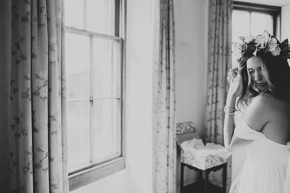 A beautiful bride wearing a Tatyana Merenyuk wedding dress and self-made floral crown for her Tipi wedding at Hill Place in Swansea. Photography by Marshal Gray. Tatyana Merenyuk, tipi wedding, hill place weddings, boho bride, marshal gray