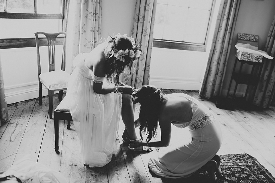 A beautiful bride wearing a Tatyana Merenyuk wedding dress and self-made floral crown for her Tipi wedding at Hill Place in Swansea. Photography by Marshal Gray. Tatyana Merenyuk, tipi wedding, hill place weddings, boho bride, marshal gray