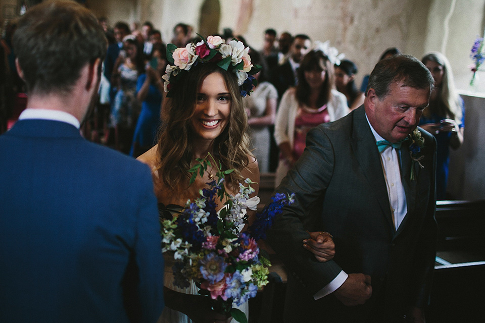 A beautiful bride wearing a Tatyana Merenyuk wedding dress and self-made floral crown for her Tipi wedding at Hill Place in Swansea. Photography by Marshal Gray. Tatyana Merenyuk, tipi wedding, hill place weddings, boho bride, marshal gray