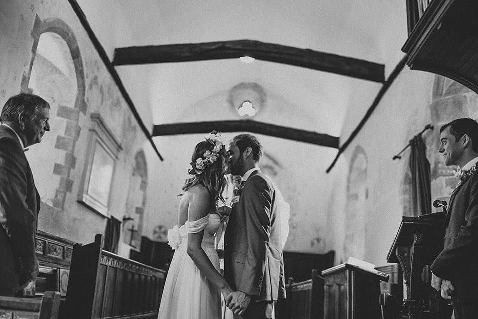 A beautiful bride wearing a Tatyana Merenyuk wedding dress and self-made floral crown for her Tipi wedding at Hill Place in Swansea. Photography by Marshal Gray. Tatyana Merenyuk, tipi wedding, hill place weddings, boho bride, marshal gray