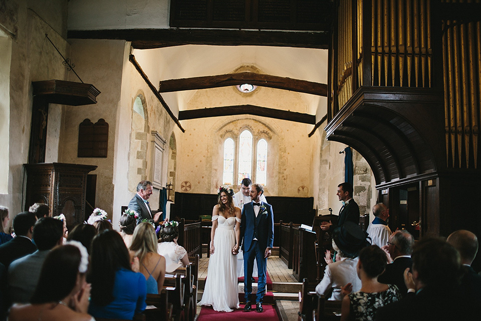 A beautiful bride wearing a Tatyana Merenyuk wedding dress and self-made floral crown for her Tipi wedding at Hill Place in Swansea. Photography by Marshal Gray. Tatyana Merenyuk, tipi wedding, hill place weddings, boho bride, marshal gray